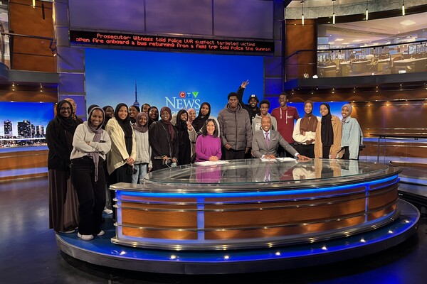 Pictured: Ikran Ali (far right) with Say Somaali youth and CTV reporters at CTV headquarters in Scarborough learning about journalism. Say Somaali is a youth program that aims to provide Somaali youth in the GTA with opportunities to explore various career professions.