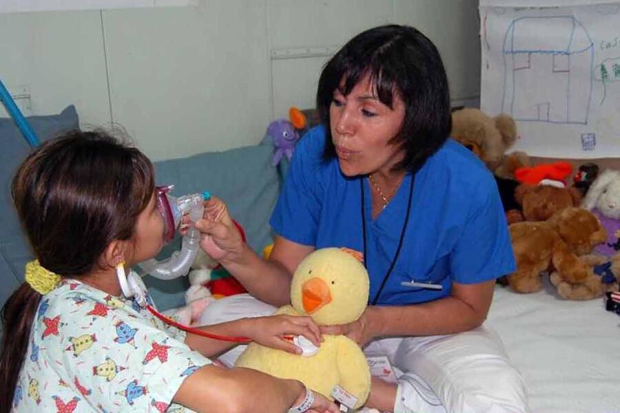 A child is provided with respiratory therapy 