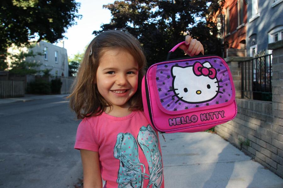 Child with lunch pack