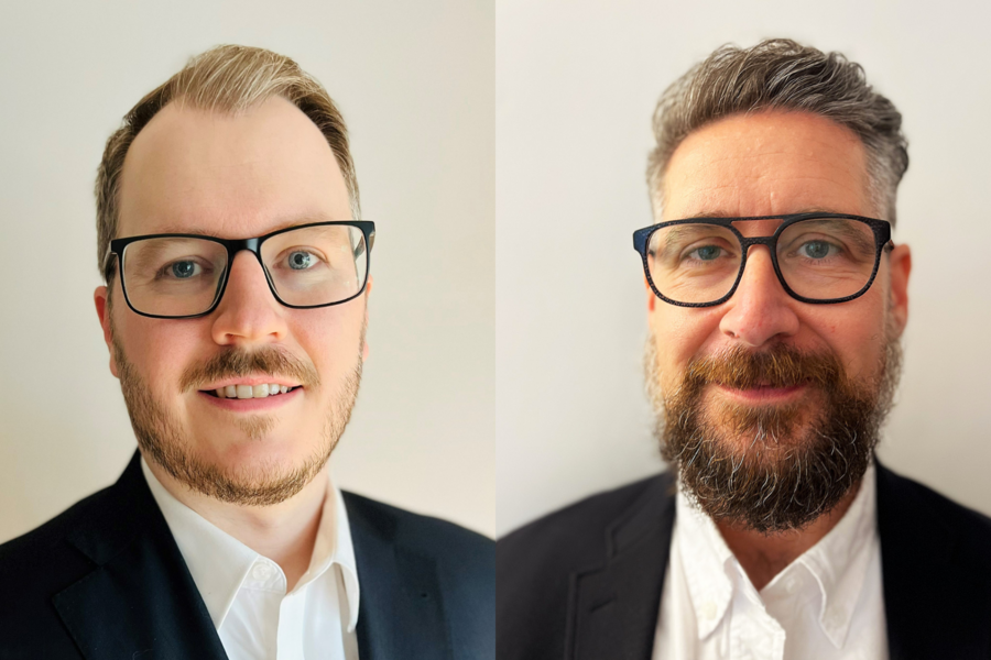 Headshots of Kyle Burrows and Arthur Mortha. Both wearing white shirts with black jackets.