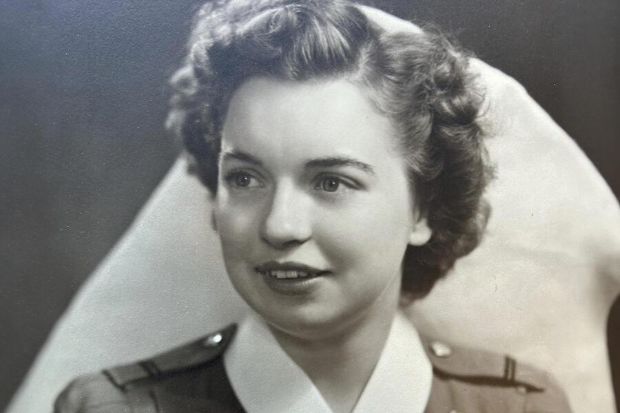 A black and white photo of Suzanne in her WWII nurses uniform