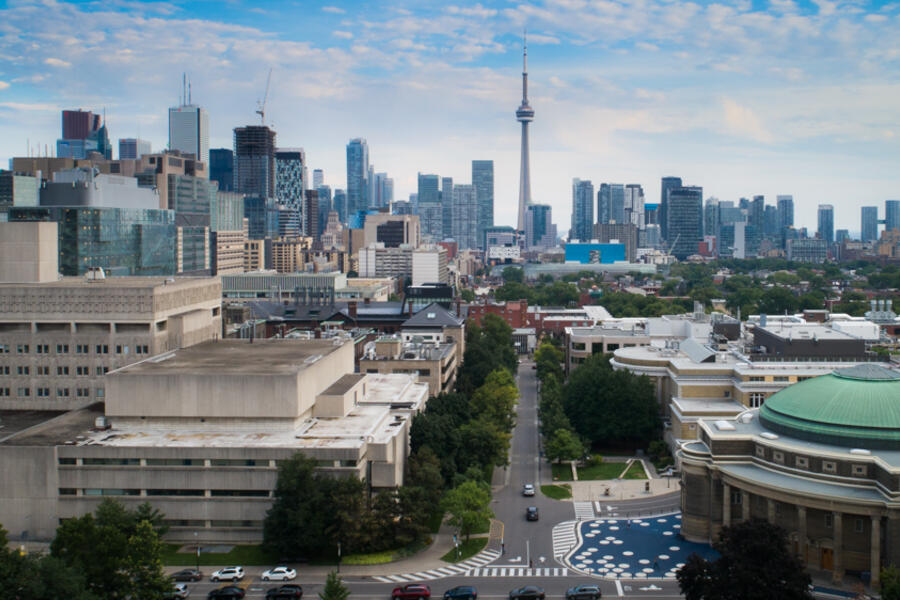 University of Toronto's Medical Sciences Building and Convocation Hall with the CN Tower visible in the background.