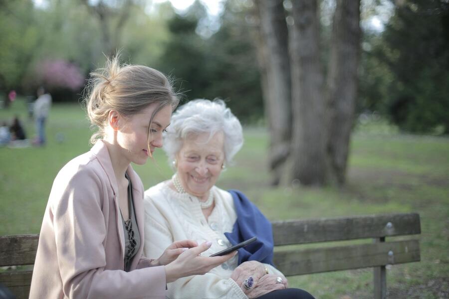 caregiver helping older adult