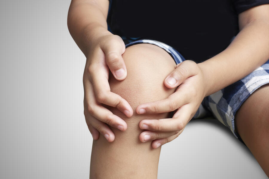 boy with a painful knee