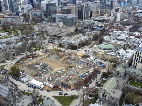 Aerial photo shows construction underway in Kings College Circle. 