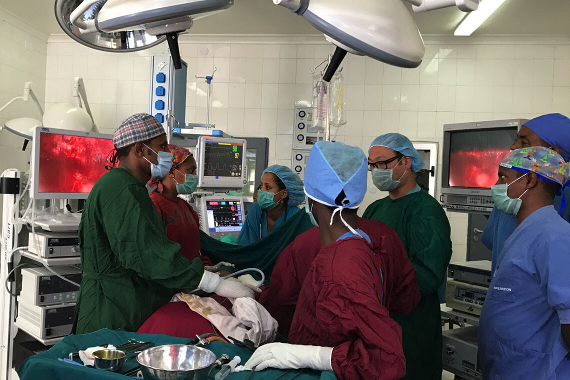In a partnership between U of T and Addis Ababa University, Dr. Michael Ko (in glasses) shows Ethiopian counterparts how to perform minimally invasive thoracic surgery using donated equipment that had been left unused (photo courtesy of Dr. Michael Ko)