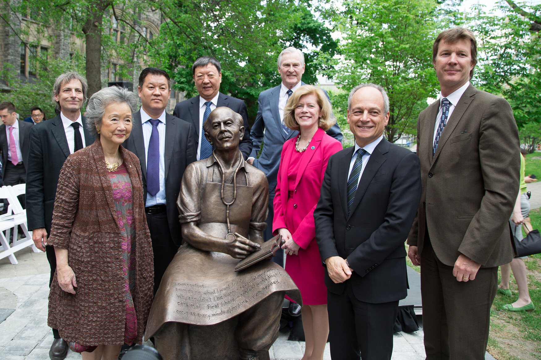 The new sculpture of Norman Bethune was unveiled May 30. Picture are (left to right): David Pellettier, Adrienne Clarkson, Zhang Bin, Niu Gensheng, Michael Wilson, Catharine Whiteside, Meric Gertler and Dr. David Price, a member of the Bethune family.