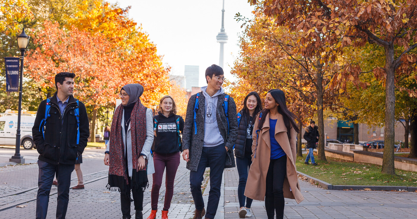 Med Students walking on campus.