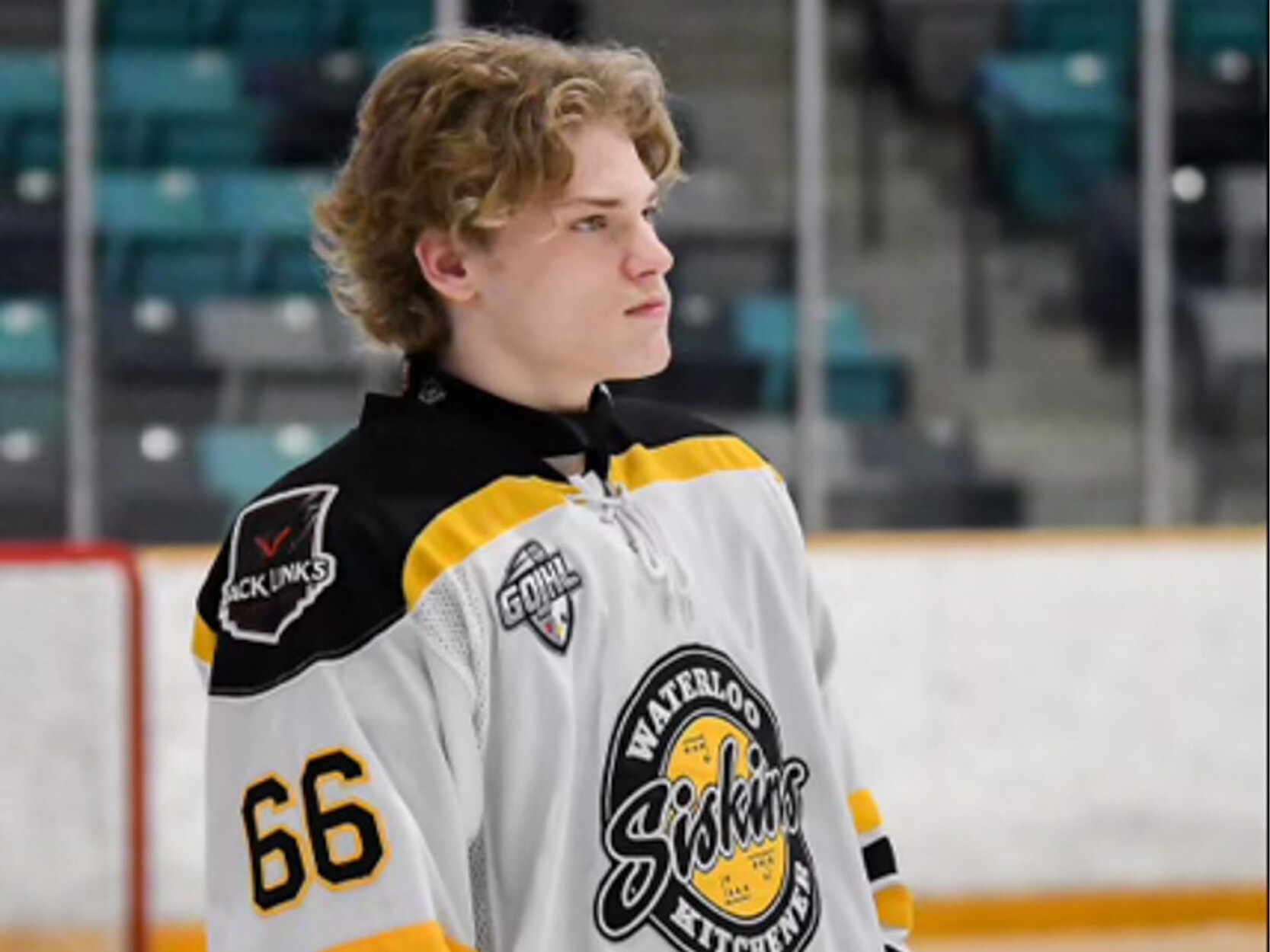 A blond hockey player with number 66 on his jersey 
