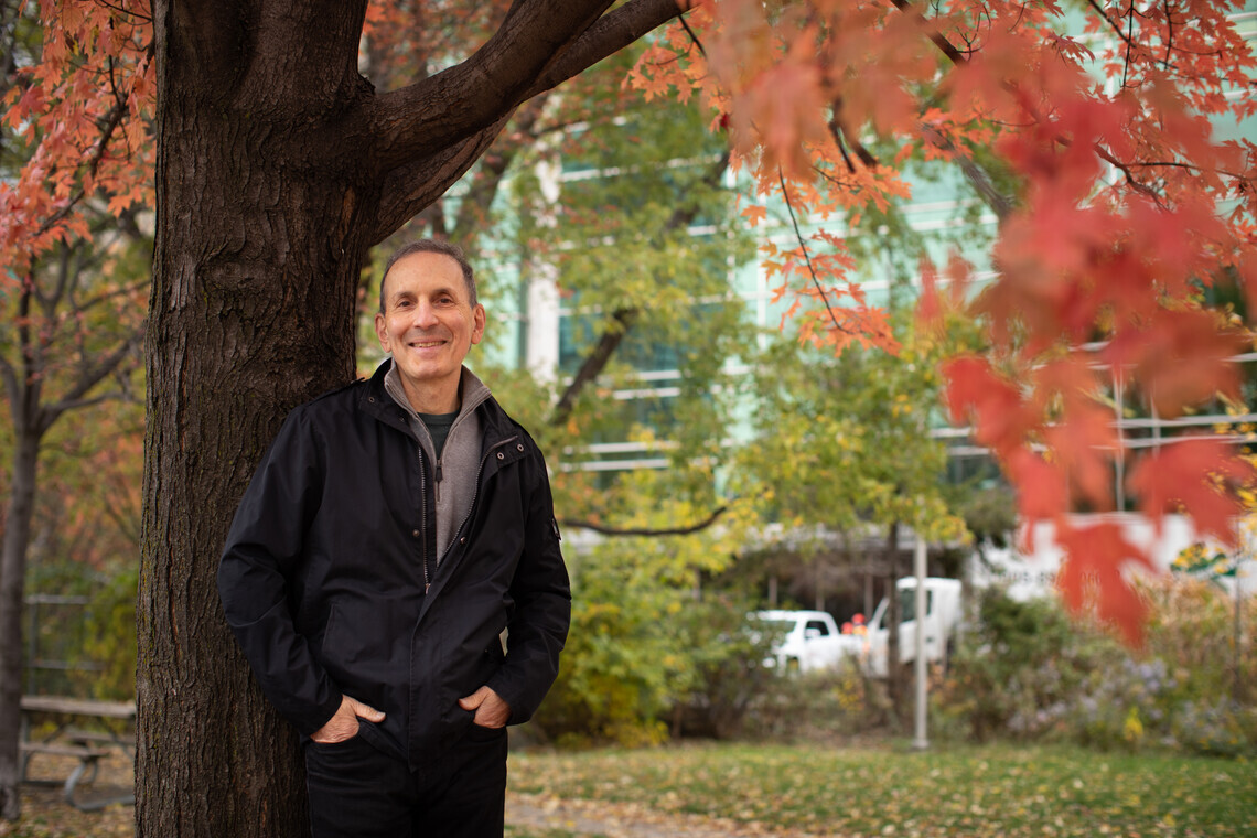 Professor Daniel Drucker outside in Fall