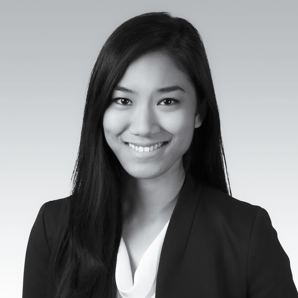 a black and white portrait of a researcher with long dark hair