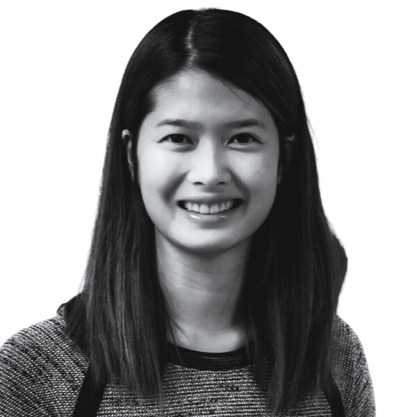 a black and white portrait of a researcher with medium length dark hair