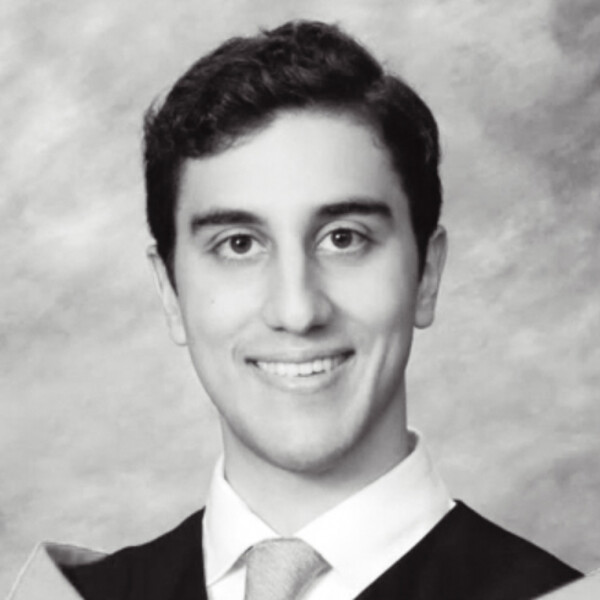 a black and white portrait of a researcher with short dark hair