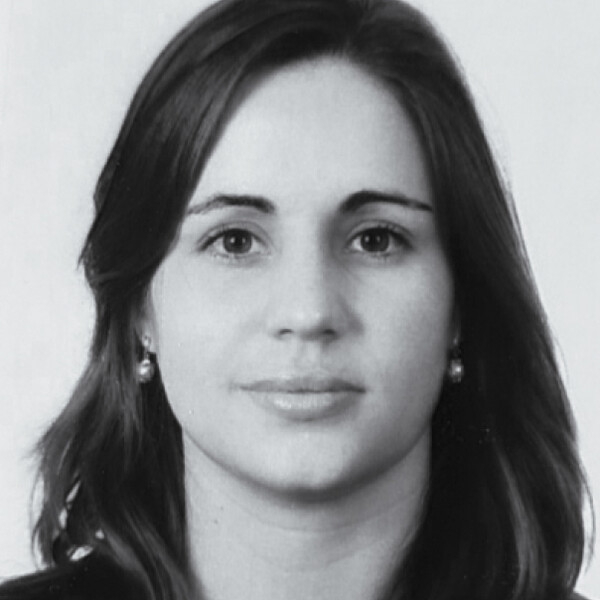 a black and white portrait of a researcher with long dark hair
